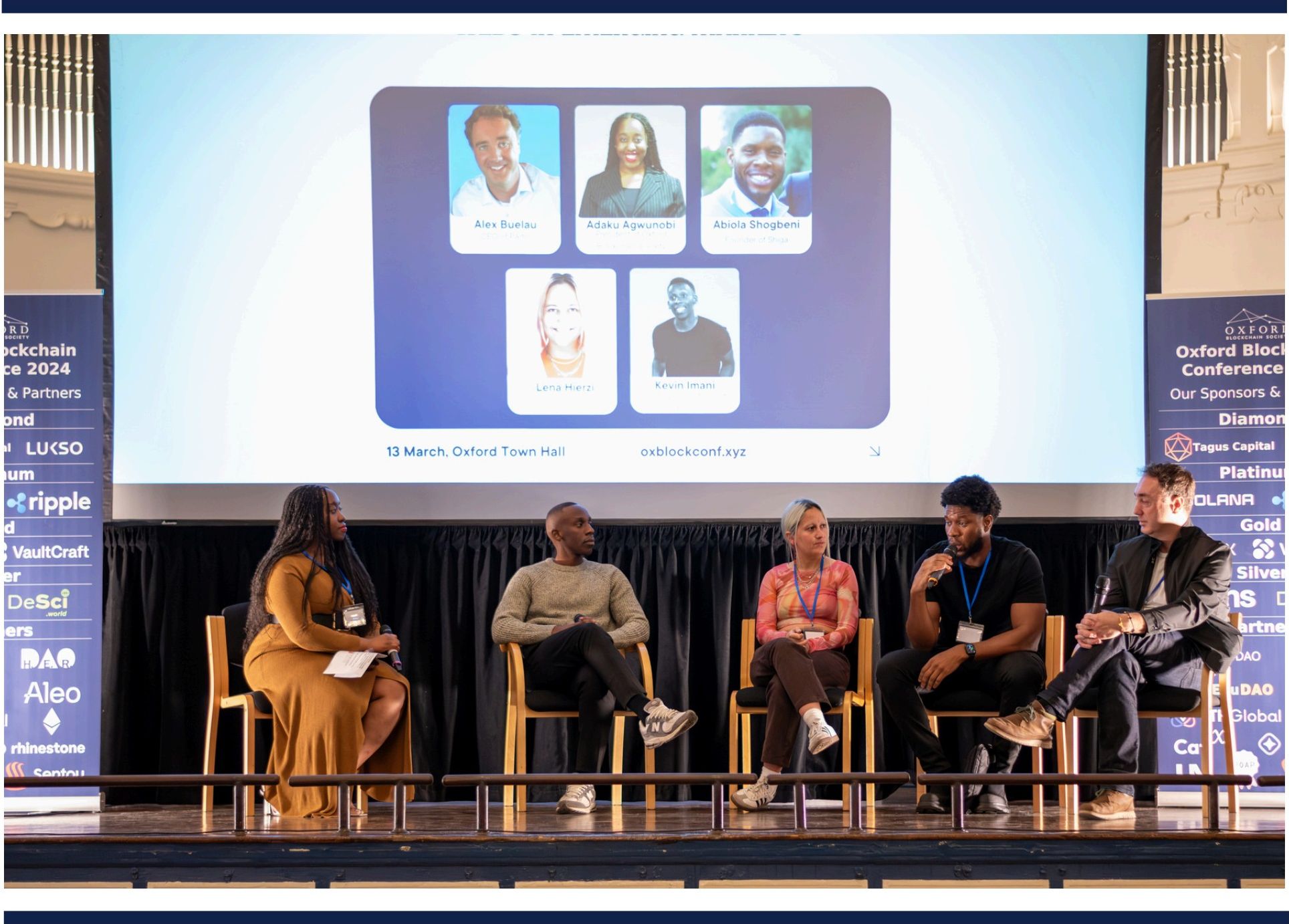 Panel discussion on stage at the Oxford Blockchain Conference